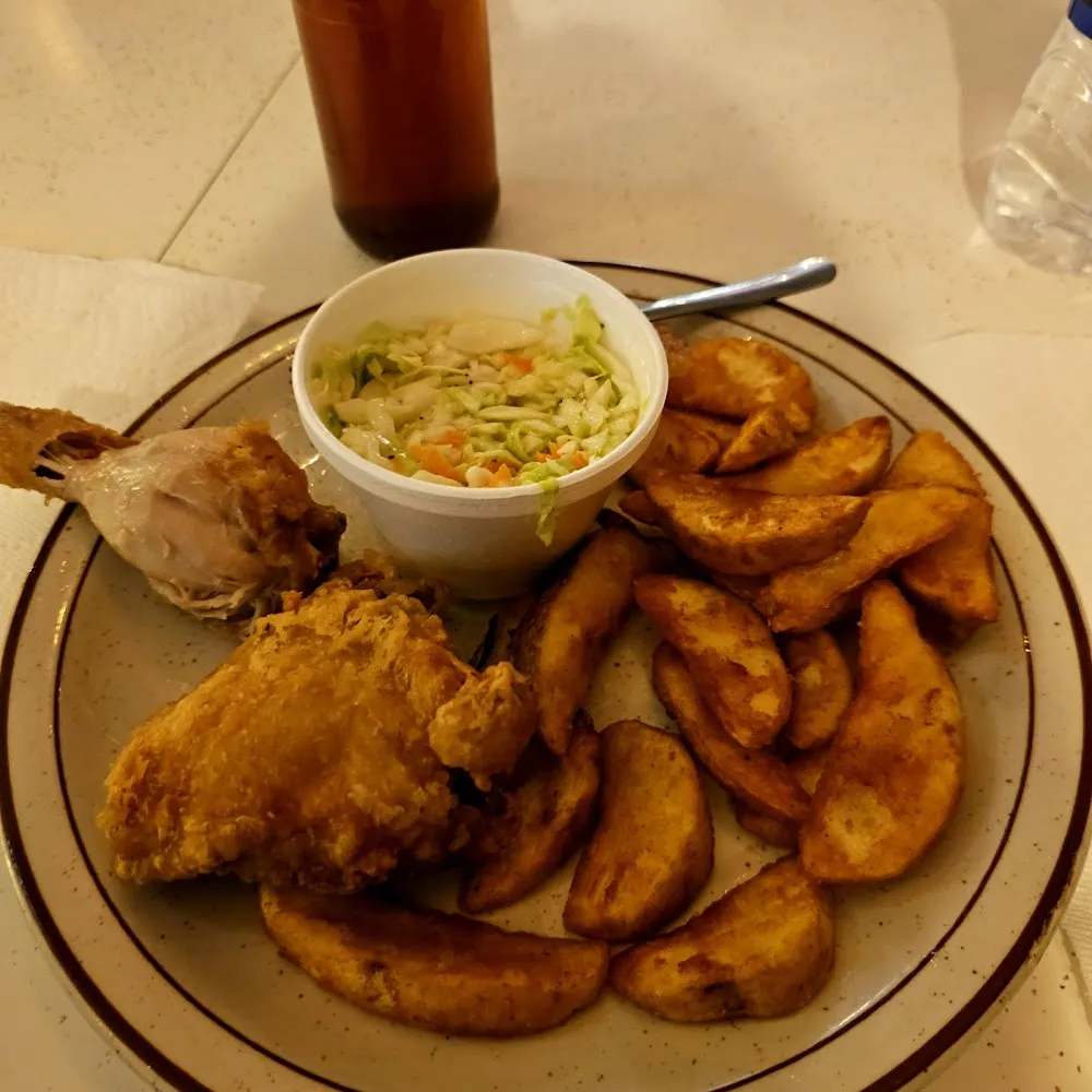 Vroasred Chicken with Fries and Coleslaw